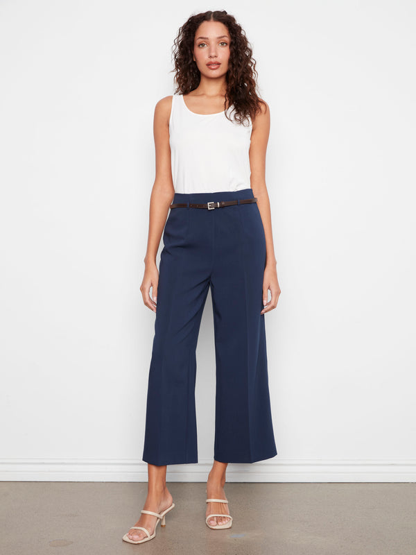 Navy cropped dressy pants with a belted waist and side zipper closure, featuring wide legs by Charlie B.
