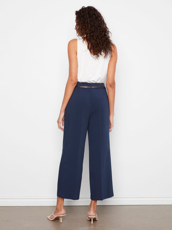 Cropped navy pants with wide legs and regular rise, finished with a stylish belted waist by Charlie B.