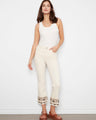Natural cropped twill pants featuring five pockets and intricate hem embroidery for a stylish touch by Charlie B.