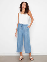 These pants feature a wide leg design, offering both style and comfort for any casual outing. By Charlie B.