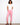 Pink cropped pants with a slim fit silhouette, featuring cuffed hems for added style. By Charlie B.