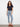 Light blue jeans with a slim fit, featuring a chic blanket stitch hem for added style by Charlie B.