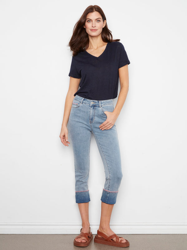Cropped length light blue jeans with embroidered details for a modern touch by Charlie B.