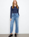 Medium blue knit denim joggers with a regular rise and elastic waistband featuring drawstring detail by Charlie B.
