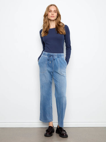 Crafted from soft knit denim, these pants offer a relaxed fit with an adjustable drawstring waist for added comfort by Charlie B.