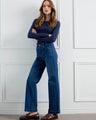 Denim jeans with a straight fit, showcasing front panel pockets for added style by Charlie B.