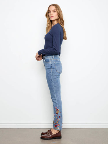 Enjoy the comfort of stretch denim in these medium blue jeans, complete with a regular rise and floral hem detail by Charlie B.