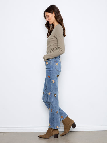 Experience comfort with an elastic waistband in these stretch denim jeans, designed for all-day wear. By Charlie B.