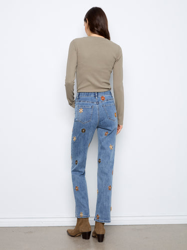 Stay organized with 5 pockets in these versatile denim jeans, blending fashion and function seamlessly. By Charlie B.