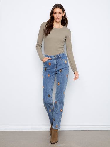 Crafted from stretch denim, these jeans offer flexibility and ease of movement while maintaining style. By Charlie B.