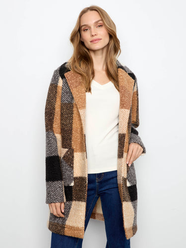 Stay cozy and fashionable with the patch pockets on this longline coat. By Charlie B.