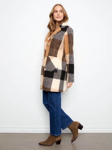 Elevate your wardrobe with this plaid coat, complete with practical patch pockets. By Charlie B.