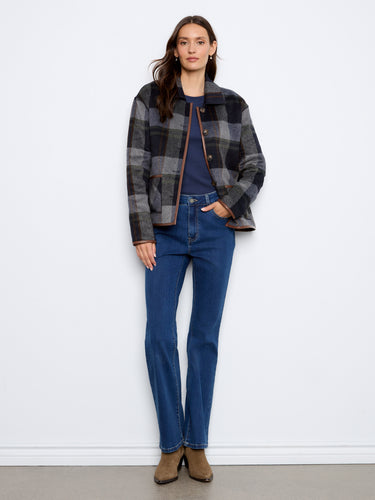 Plaid jacket with faux leather binding and convenient patch pockets, perfect for versatile styling by Charlie B.