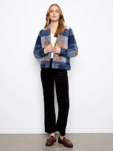 The tailored collar of this jacket enhances its sophisticated appearance, making it perfect for any occasion by Charlie B.