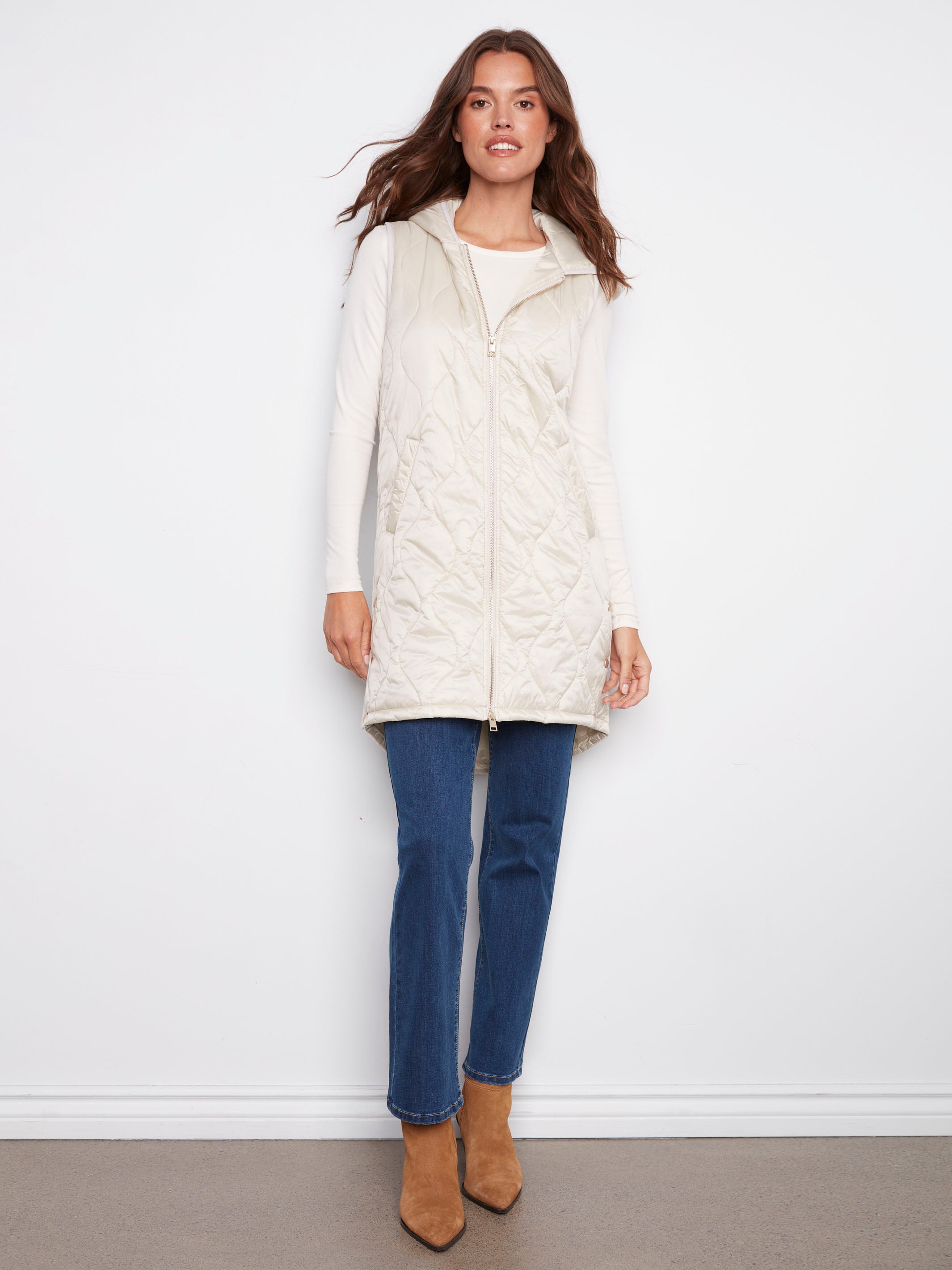 Champagne vest with a quilted texture and side snap buttons, offering a stylish look by Charlie B.