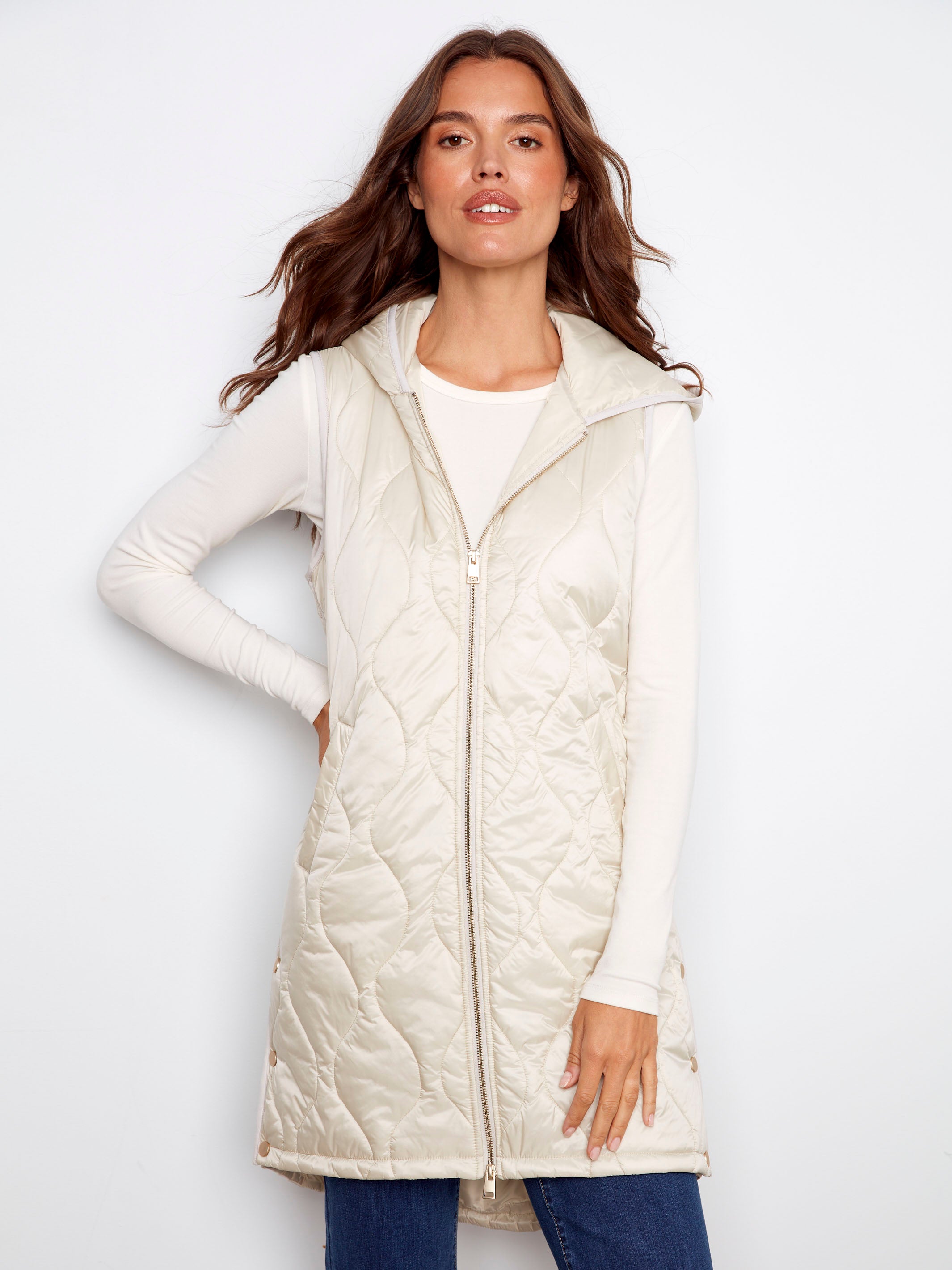 This champagne vest features a zipper front closure for versatile styling by Charlie B.