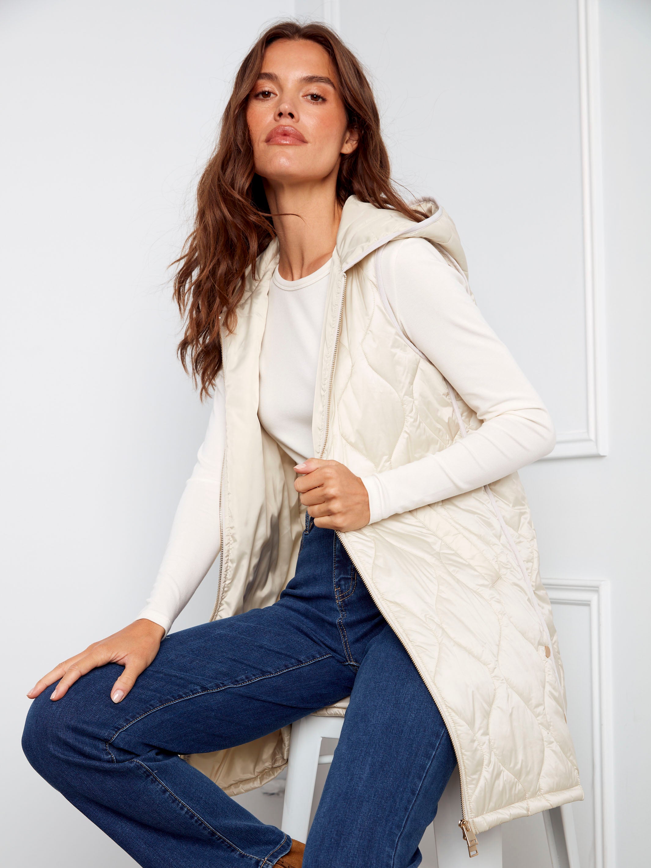 Pearlized finish on this champagne vest adds a touch of sophistication by Charlie B.