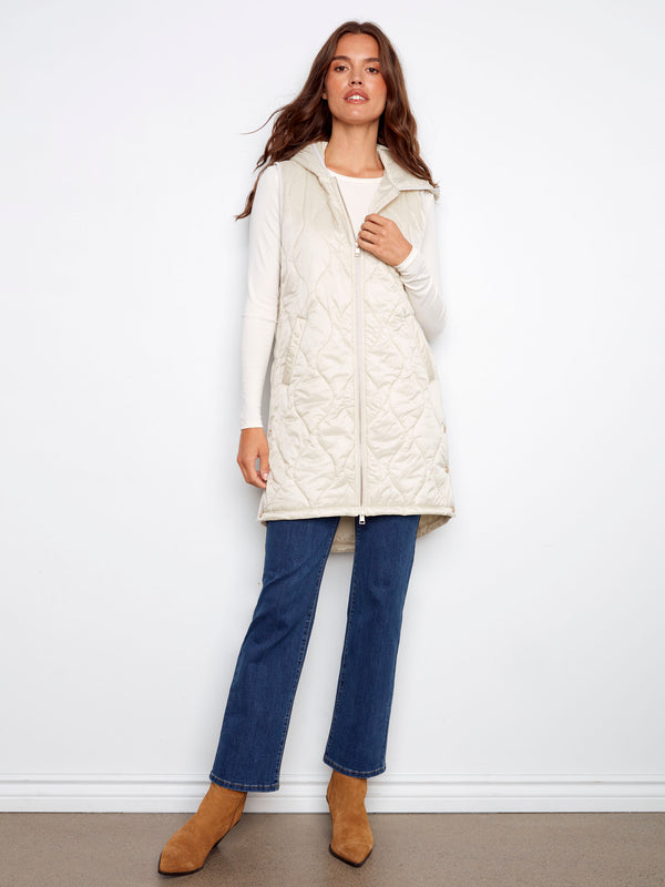 Zipper front closure enhances the sleek look of this long hooded champagne vest by Charlie B.