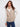 Quilted reversible vest with zipper front closure, ideal for versatile styling by Charlie B.