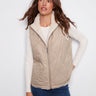 Quilted reversible vest with zipper front closure, ideal for versatile styling by Charlie B.