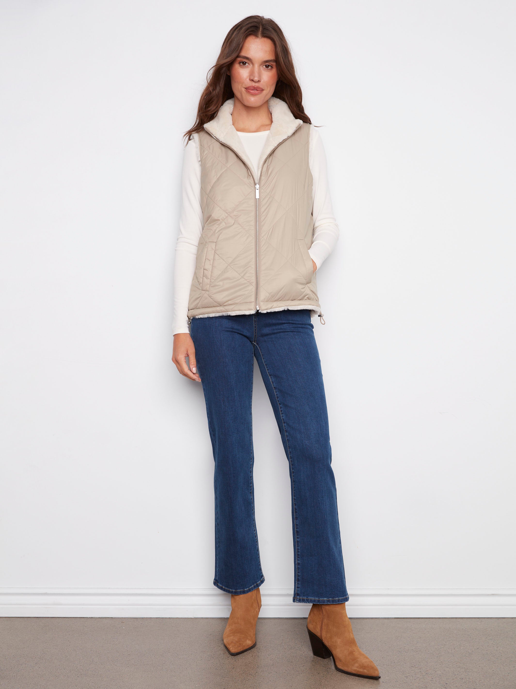 Stylish greige vest showcasing quilted design and practical welt pockets by Charlie B.