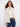 Elegant faux fur reversible vest in greige with convenient welt pockets by Charlie B.