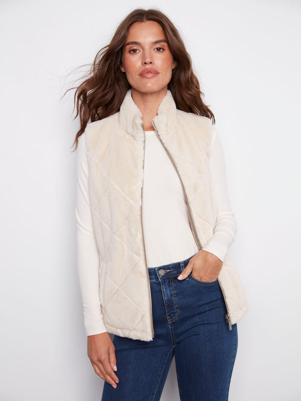 Elegant faux fur reversible vest in greige with convenient welt pockets by Charlie B.