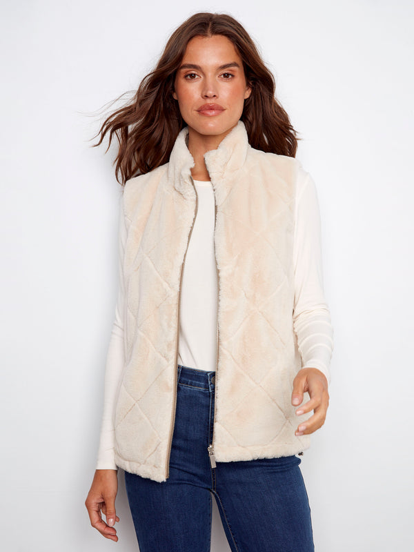 Reversible design quilted vest in greige, providing warmth and fashion versatility by Charlie B.