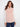 Ballet pink vest with soft faux fur, featuring welt pockets for added convenience by Charlie B.