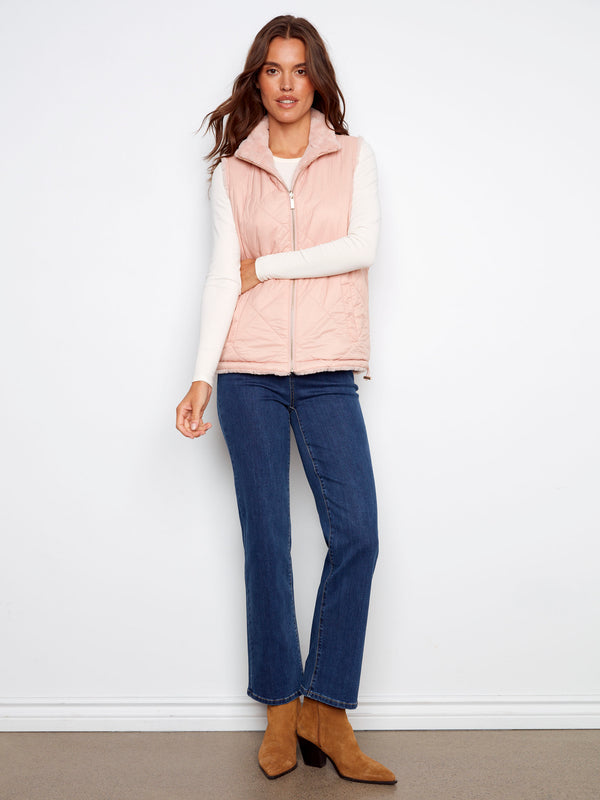 Chic ballet pink vest with quilted and faux fur reversible design for versatile styling by Charlie B.