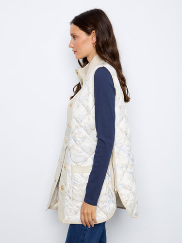Side zipper details enhance the sleek look of this versatile sleeveless quilted vest by Charlie B.