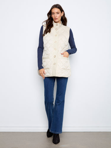 Stylish vest with a stand collar and quilted pattern, adding a touch of elegance to your ensemble. By Charlie B.