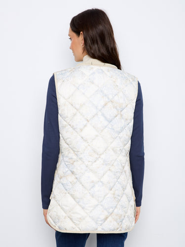 Welt pockets add convenience and practicality to this fashionable quilted sleeveless vest. By Charlie B.