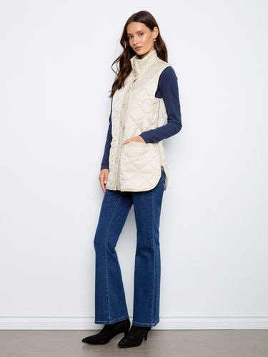 The stand collar on this quilted vest brings added warmth and sophistication to your look. By Charlie B.