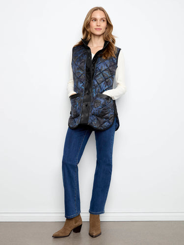 Stylish vest featuring a stand collar, perfect for adding a touch of elegance to any outfit. By Charlie B.