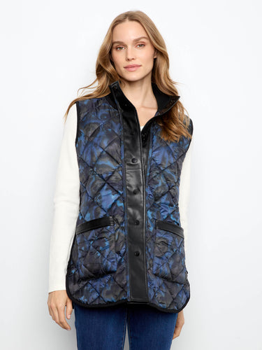 Elegant stand collar elevates the sophistication of this reversible quilted vest design. By Charlie B.