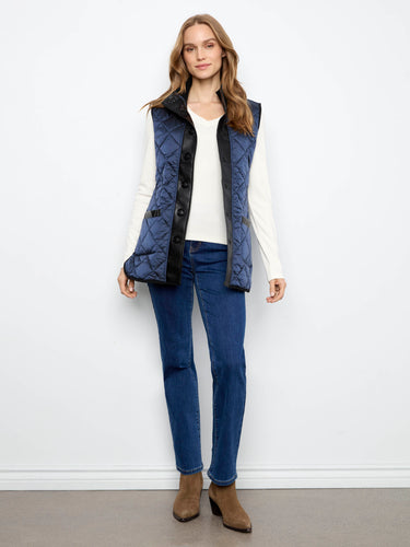 Reversible feature offers two stylish looks in one versatile quilted vest piece. By Charlie B.