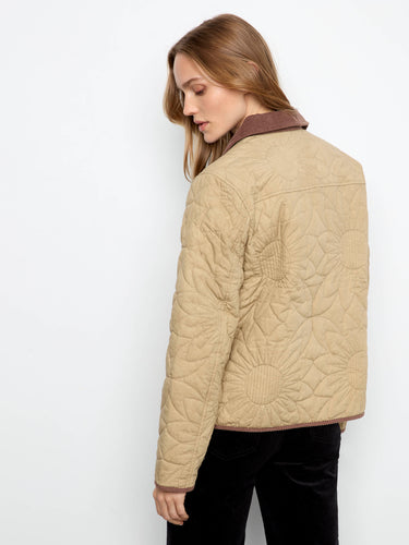 Patch pockets offer both convenience and charm on this beautifully crafted jacket, enhancing its practicality. By the talented team at Charlie B.
