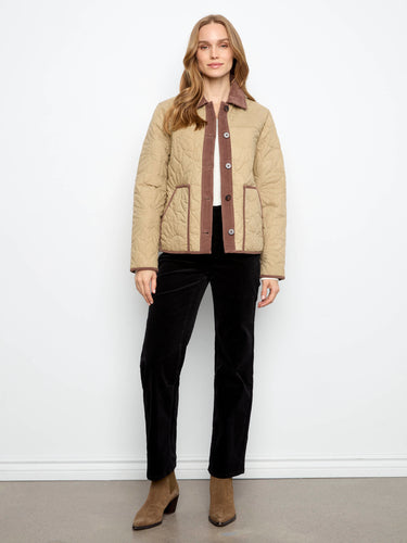 This jacket showcases a classic corduroy shirt collar, adding sophistication to your wardrobe. Designed by Charlie B.