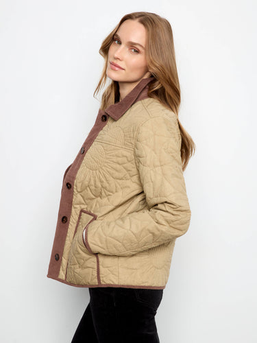 Elegant outerwear with corduroy trim that enhances its stylish appeal. A must-have piece created by Charlie B.