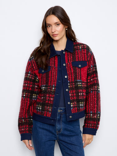 Trendy red plaid jacket enhanced with denim trim details, elevating its overall appeal. Designed by Charlie B.