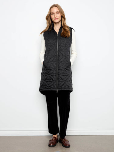 Designed with practical welt pockets, this vest combines functionality with fashion effortlessly. By Charlie B.