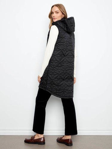 Featuring side snap buttons, this chic black vest adds an extra touch of elegance to your wardrobe. By Charlie B.