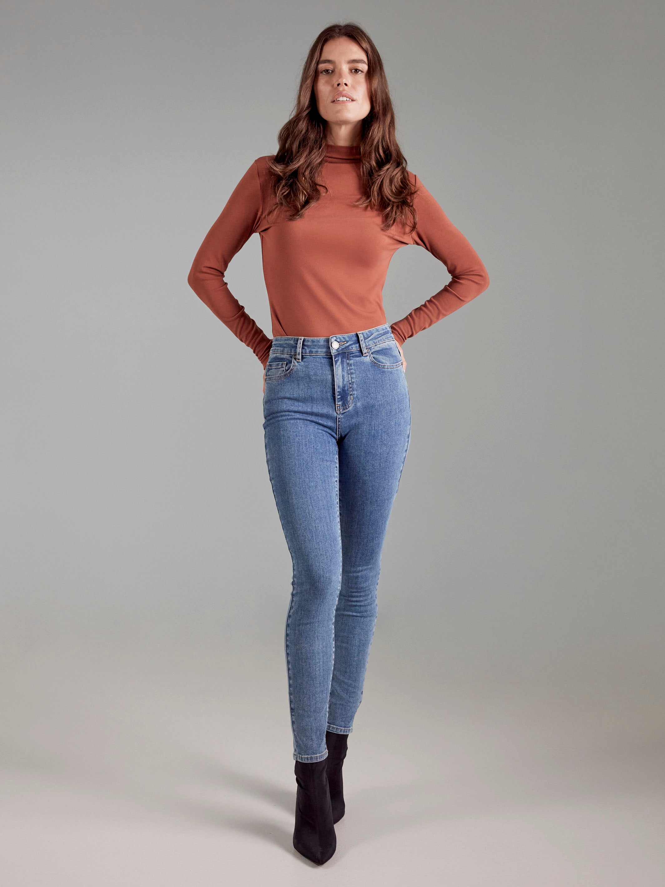 Versatile long-sleeve mock neck top in sepia, crafted for comfort and style by Charlie B.
