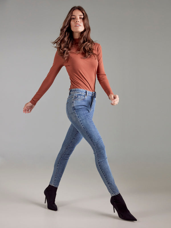 Sophisticated slim fit sepia top designed with long sleeves and fine ribbing by Charlie B.