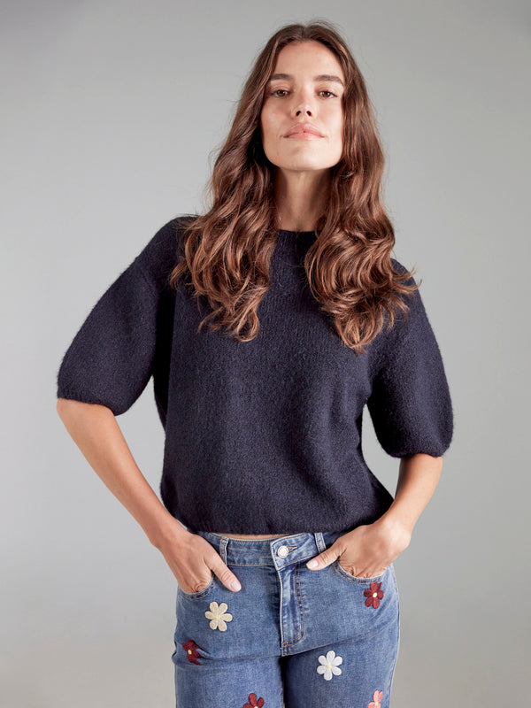 Discover effortless style with the balloon-sleeve design of this chic Moonlight knit sweater by Charlie B.