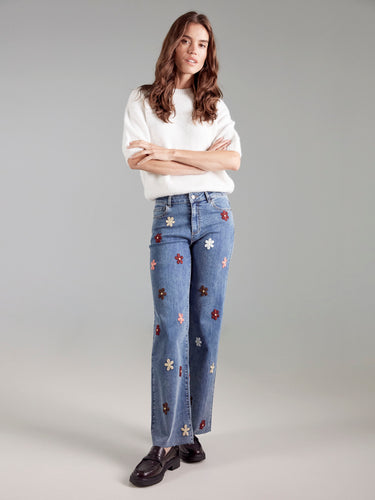 Cozy ecru sweater highlighting its plush knit fabric, ensuring warmth and comfort throughout the day by Charlie B.