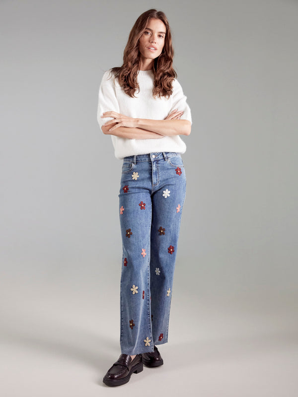 Cozy ecru sweater highlighting its plush knit fabric, ensuring warmth and comfort throughout the day by Charlie B.