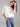 Trendy ecru balloon sleeve sweater designed for a relaxed fit that complements any casual outfit by Charlie B.