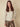 Champagne metallic knit with long sleeves and classic drawstring hood for effortless style by Charlie B.